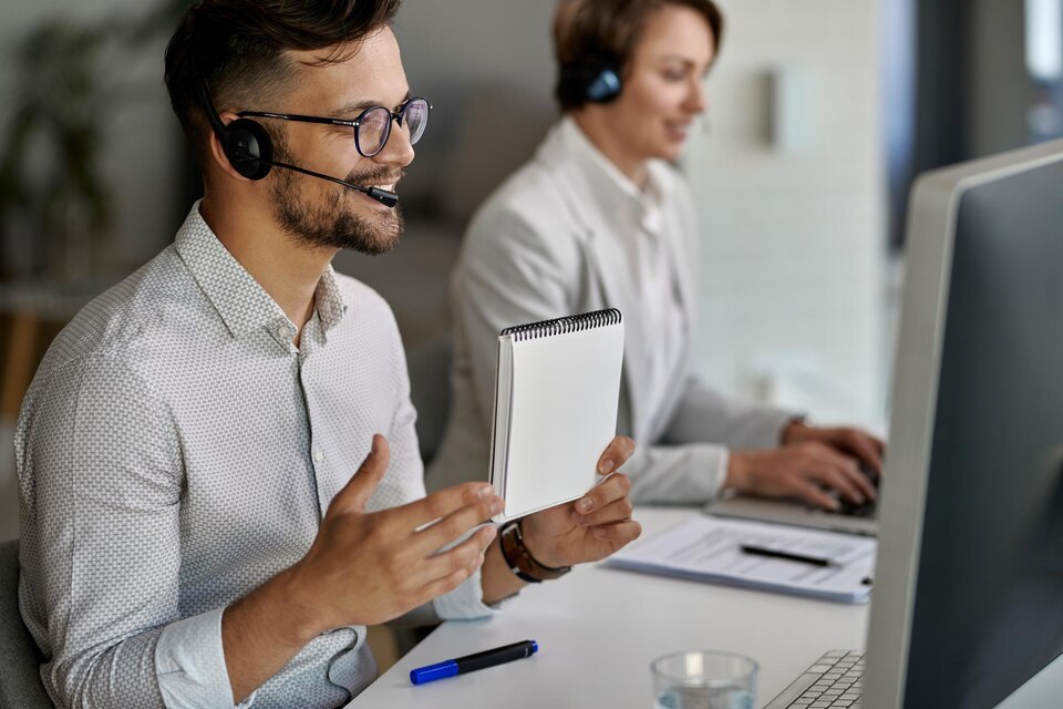 A diverse team of call center agents with headsets, ready to provide a wide range of call center services