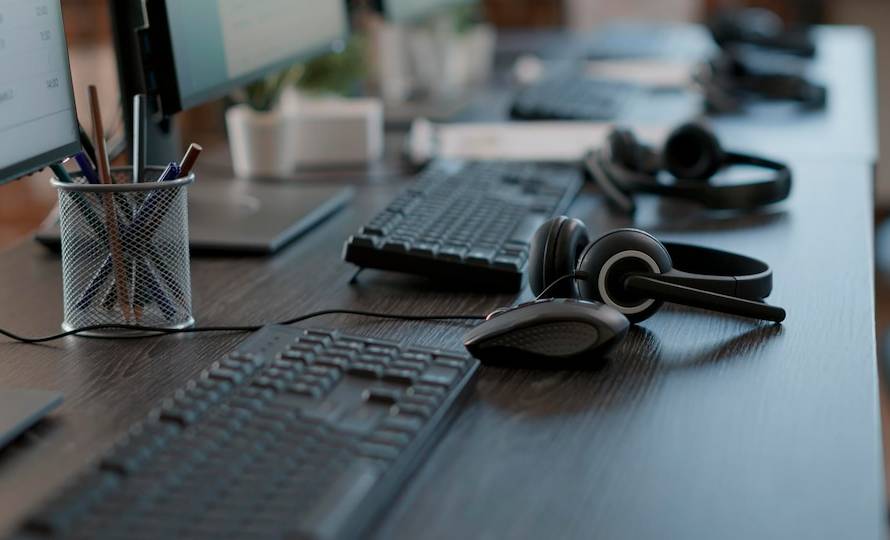 A busy call center with agents working at their desks, representing the fast-paced environment of call centers.